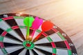 Dart hitting on center with fire on dartboard for business concept. Royalty Free Stock Photo